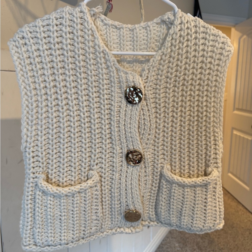 Chunky Knit Sleeveless Cardigan with Decorative Buttons in Cream